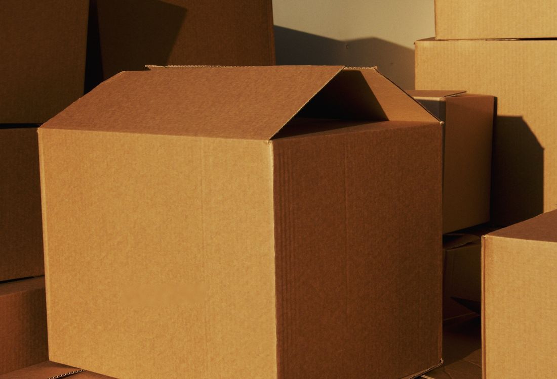 Close-up of corrugated cardboard wall showing the fluted medium between two liners