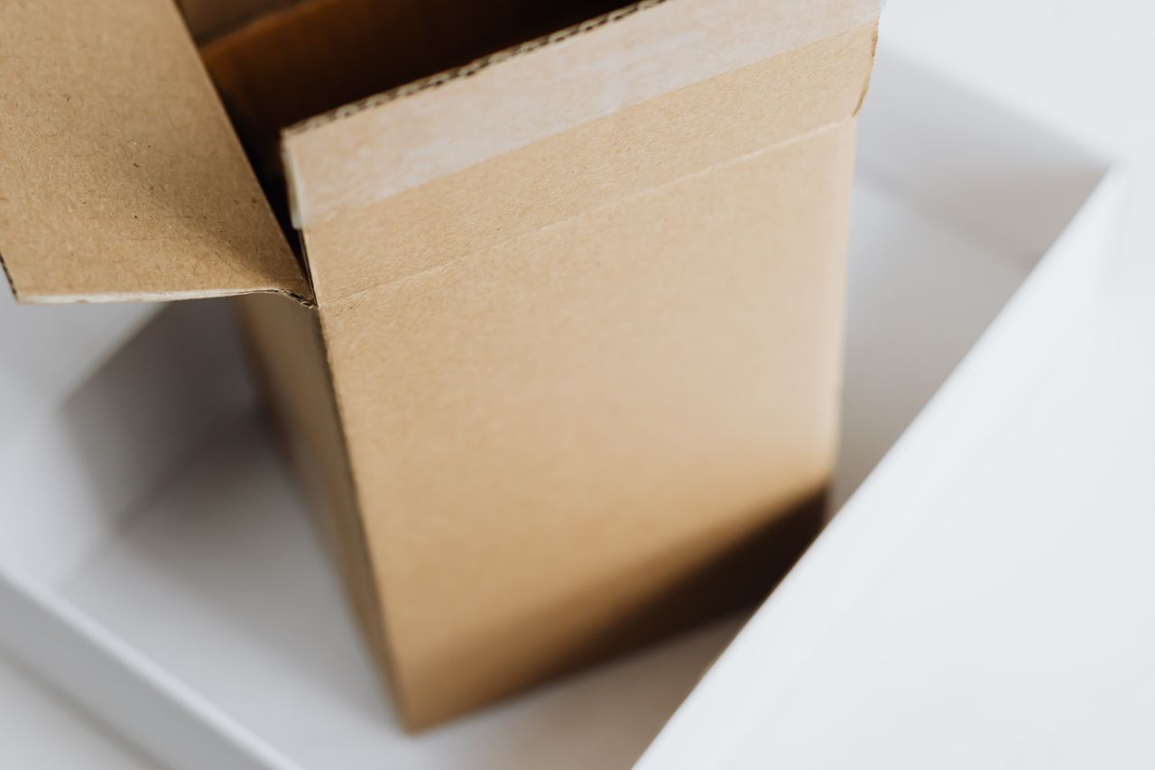 Printed two-piece retail boxes packed alongside shipping cartons